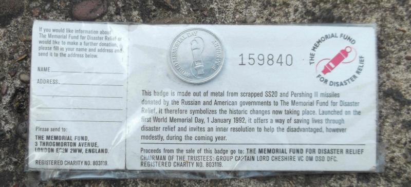 Memorial Fund for Disaster Relief Pin Badge Scrap Missile Metal